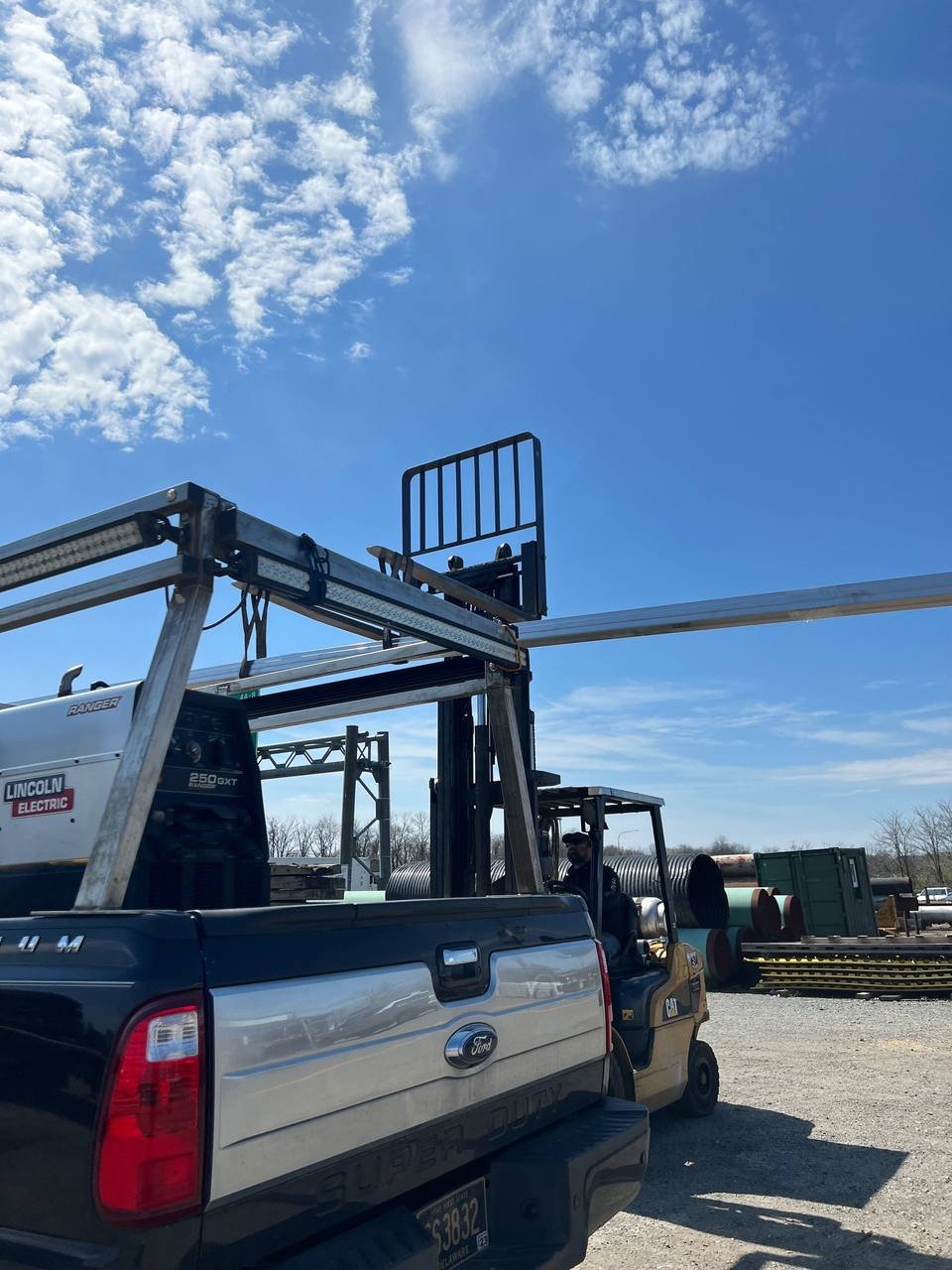 Mobile welding truck with rack on a job site in Delaware